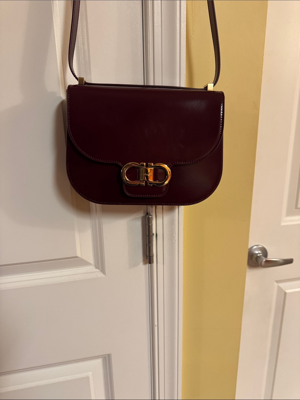 Salvatore Ferragamo Burgundy Gancini Crossbody Bag with Gold Hardware